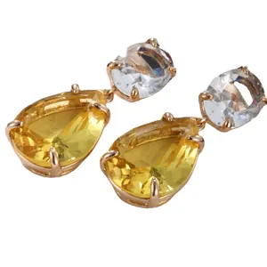 Elegant gold drop earrings with oval clear stone and yellow pear-cut gemstone