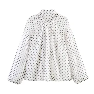 Elegant white polka dot chiffon blouse with high neck and long lantern sleeves