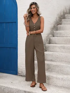 Detail of coffee brown sleeveless jumpsuit featuring textured fabric and waist drawstring