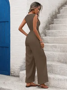 Detail of sleeveless high-waisted wide-leg jumpsuit with vertical texture fabric