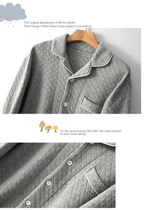 Detailed view of grey quilted pajama top with diamond pattern and button closure