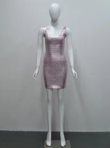 Front view of metallic rose gold bandage dress showing bodycon fit and sleek texture