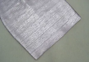 Detail of lavender fabric with silver metallic coating and horizontal pleated texture