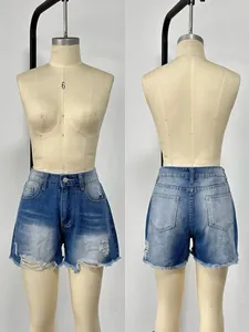 Front and back detail of high-waisted distressed denim shorts with frayed edges and ripped texture