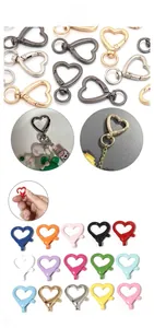 Macro shot of colorful heart-shaped alloy lobster clasps with smooth spring opening