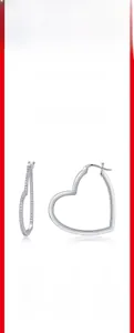 Macro shot of S925 sterling silver heart-shaped hoop earrings with moissanite stones