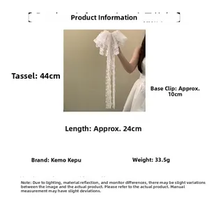 Detailansicht der weißen Spitzen-Haarklammer mit 44cm Quasten und 10cm Basis-Clip