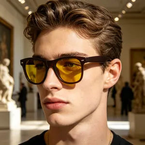 Close-up of polarized night vision sunglasses with yellow lenses and tortoise frame