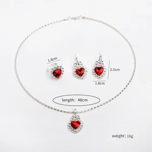 Silver-tone jewelry set with red heart stones showing detailed dimensions and weight