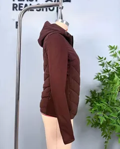 Side view of hooded wine red puffer jacket with diamond quilted pattern for women