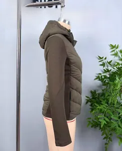 Close-up of diamond-quilted hooded jacket in army green with contrasting sleeves