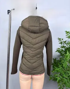 Detail view of the V-shape quilted stitching on olive green hooded jacket for women