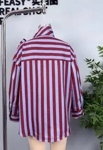 Detail view of red and blue vertical striped cotton shirt back with horizontal yoke