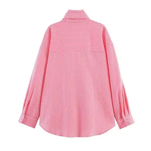 Detail of pink and white striped shirt back with horizontal and vertical pattern mixing