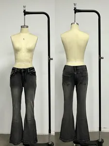 Front and back detail of slim fit flared jeans with high waist and washed denim finish