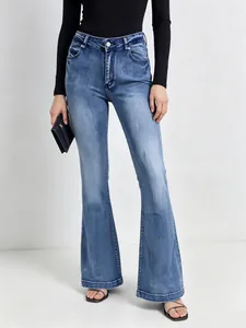 Women's high waist flared jeans in washed blue with slim fit and vintage denim texture