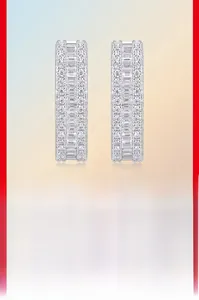 Macro view of 925 sterling silver hoop earrings with triple-row moissanite stones