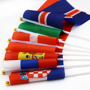 Set of 14x21cm hand-held international flags with white poles and gold toppers