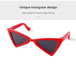 Detailed view of red triangular pet sunglasses made of durable and lightweight PP material