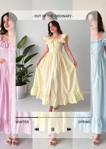 Détail des robes maxi à rayures rose, jaune et bleu avec volants et boutons blancs
