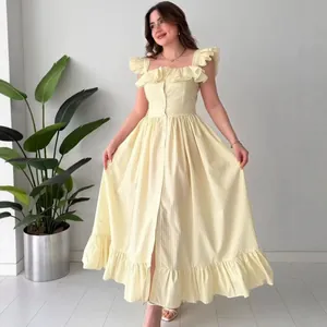 Robe midi élégante à rayures jaunes et blanches avec bretelles à volants