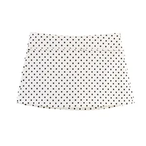Gonna-pantalone a trapezio da donna con classico motivo a pois bianchi e neri e cintura