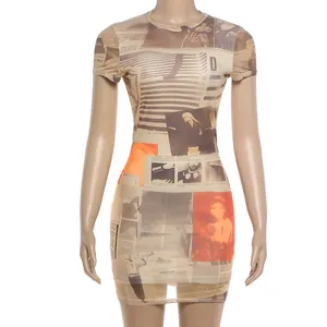 Detail of the mesh fabric featuring a vintage newspaper print with orange accents