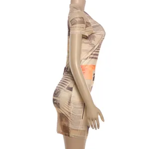 Detail view of the vintage newspaper print pattern on this slim fit mini dress