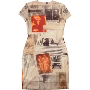 Detailed flat lay of bodycon mini dress with vintage newspaper collage print
