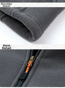 Detail of fleece vest shoulder and hem with durable zipper and orange pull cord