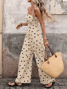 Close-up of vintage polka dot sleeveless jumpsuit with flowing wide leg silhouette