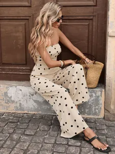 Close-up of retro polka dot strapless jumpsuit featuring elegant wide-leg trousers
