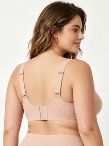 U-back wire-free nude bra featuring wide adjustable straps and double hook-and-eye closure