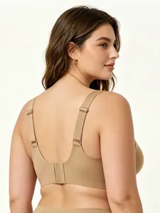 U-shaped back of seamless skin-tone bra with wide elastic straps and multi-row hooks