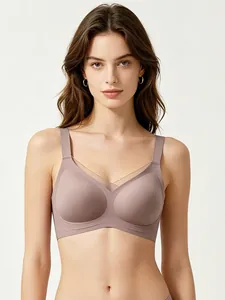 Detail showing the sheer mesh v-neckline and smooth seamless fabric of this bra