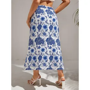 Women's high waist midi skirt with blue floral print and lightweight woven fabric