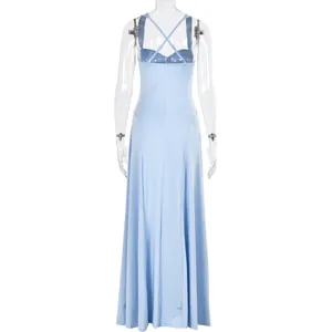 Detail of the back cross straps and slim fit cut on the baby blue maxi dress