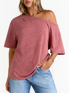 Close-up of rose pink off-the-shoulder t-shirt fabric texture and neckline detail