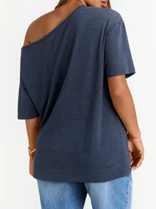 Back view of navy blue off-shoulder T-shirt showing asymmetrical cut and knit fabric