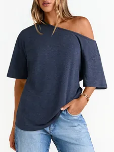 Close-up of off-shoulder dark blue t-shirt with detailed heathered fabric texture