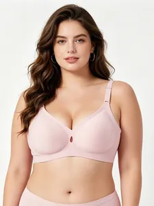 Close-up of seamless light pink wireless bra showing jelly soft support and side panels