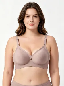 Detail of soft seamless jelly support bra with hollow-out center in mauve color