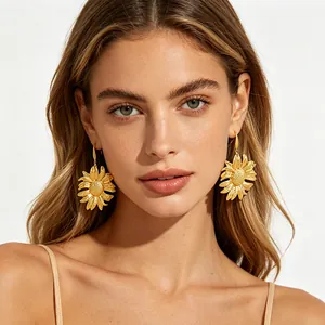 Golden sunflower drop earrings for women with layered petals and vintage metal texture