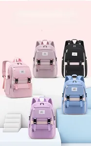 Detailed view of lightweight school backpacks in multiple colors for primary students