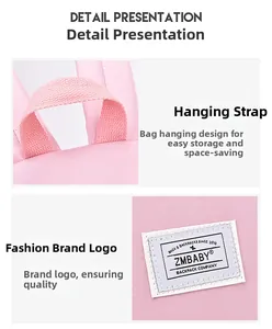 Detailed view of pink schoolbag hanging strap and ZMBABY brand logo patch