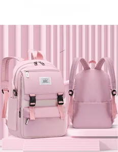 Front and back view of a pink waterproof nylon school backpack with wide straps