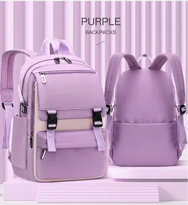 Detail view of purple student backpack with multi-pocket design and padded shoulder straps
