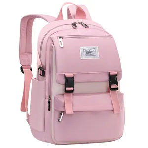 Lightweight pink student backpack for girls featuring multiple zip pockets and buckle design