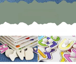 Close-up of wooden alphabet puzzle board with mushroom handles and educational letters