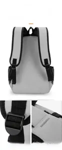 Detail of ergonomic S-shaped padded shoulder straps and reinforced stitching on travel backpack
